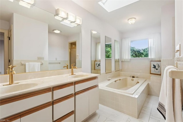 133 Randolphs Grn, Williamsburg, VA 23185 - bathroom with a bath, double vanity, marble look tiles, and a skylight