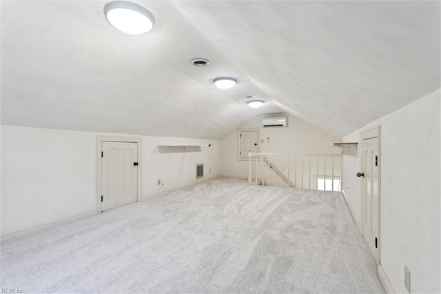 133 Randolphs Grn, Williamsburg, VA 23185 - bonus room featuring a wall unit AC, lofted ceiling, and light colored carpet