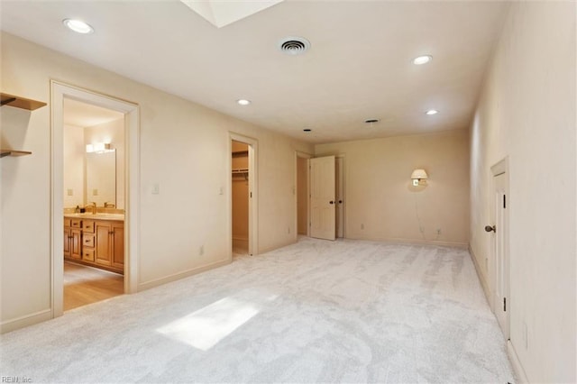 133 Randolphs Grn, Williamsburg, VA 23185 - unfurnished bedroom featuring light colored carpet, recessed lighting, a walk in closet, and ensuite bath