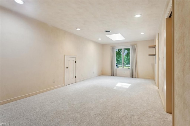 133 Randolphs Grn, Williamsburg, VA 23185 - unfurnished room with a skylight, recessed lighting, and light colored carpet