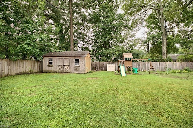 845 Cascade Dr, Newport News, VA 23608 - fenced backyard with a playground and a storage shed