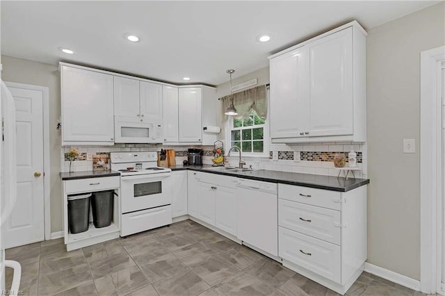 845 Cascade Dr, Newport News, VA 23608 - kitchen featuring white appliances, dark countertops, white cabinetry, and recessed lighting
