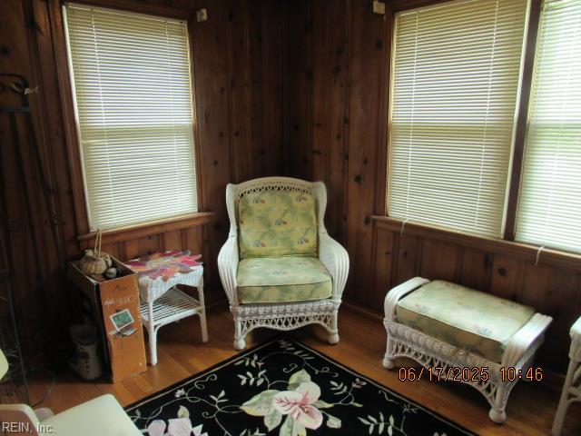 504 W Little Creek Rd, Norfolk, VA 23505 - sitting room featuring wooden walls and wood finished floors
