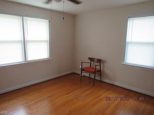 504 W Little Creek Rd, Norfolk, VA 23505 - empty room with light wood finished floors and a ceiling fan