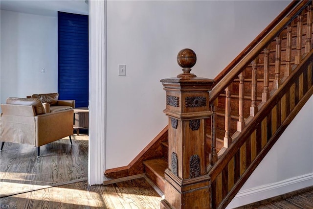 826 Lee St, West Point, VA 23181 - staircase with wood finished floors and baseboards