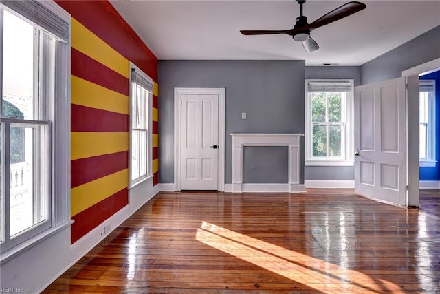 826 Lee St, West Point, VA 23181 - unfurnished living room featuring hardwood / wood-style flooring and ceiling fan