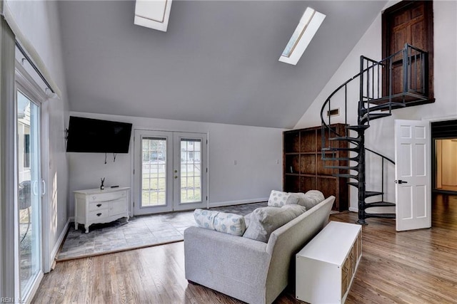 826 Lee St, West Point, VA 23181 - living room with a skylight, stairs, healthy amount of natural light, and high vaulted ceiling