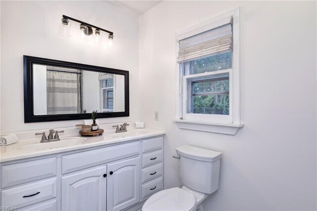 826 Lee St, West Point, VA 23181 - bathroom with toilet and double vanity