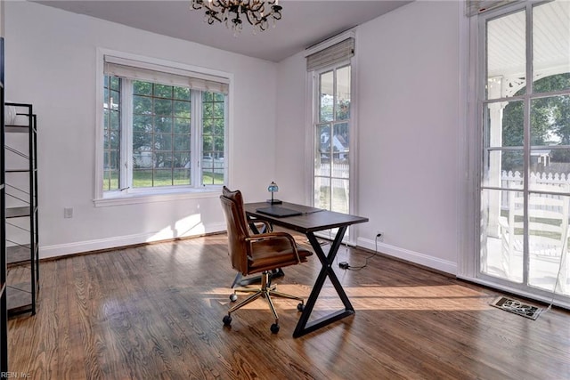 826 Lee St, West Point, VA 23181 - office space with dark wood-style flooring and a chandelier