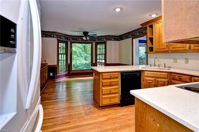 308 Royal Grant Dr, Williamsburg, VA 23185 - kitchen with black dishwasher, freestanding refrigerator, a peninsula, light countertops, and ceiling fan