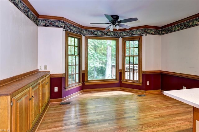 308 Royal Grant Dr, Williamsburg, VA 23185 - unfurnished dining area featuring light wood finished floors, a ceiling fan, and ornamental molding