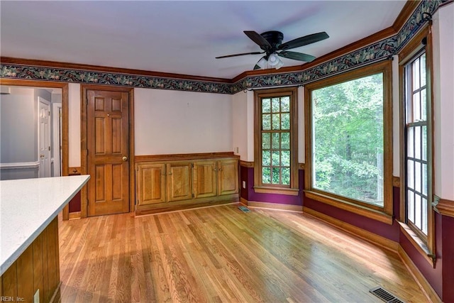 308 Royal Grant Dr, Williamsburg, VA 23185 - unfurnished dining area featuring light wood finished floors, a ceiling fan, and ornamental molding