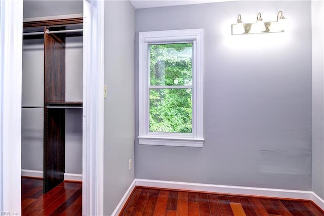 308 Royal Grant Dr, Williamsburg, VA 23185 - unfurnished bedroom with wood finished floors and a closet