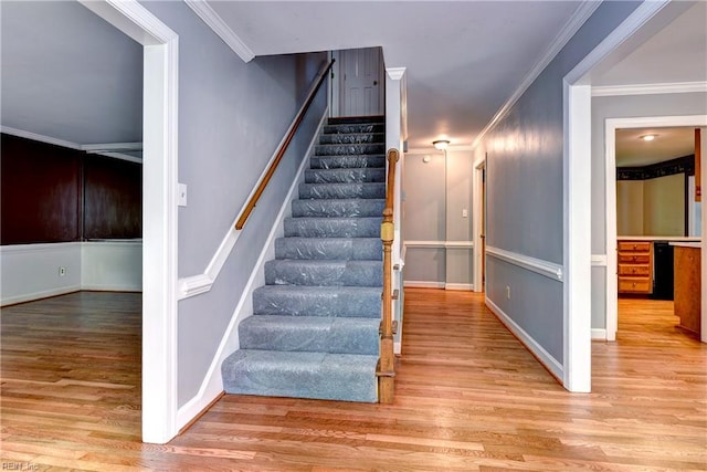 308 Royal Grant Dr, Williamsburg, VA 23185 - stairs with wood finished floors and ornamental molding