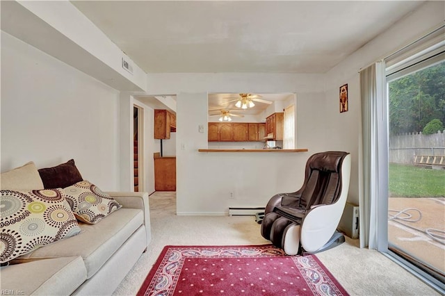 713 Bishop Dr, Virginia Beach, VA 23455 - living room featuring light carpet, a baseboard radiator, and ceiling fan