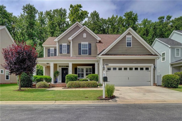 5560 Botanical Dr, Virginia Beach, VA 23455 - view of front facade featuring driveway, a front lawn, a porch, and a shingled roof