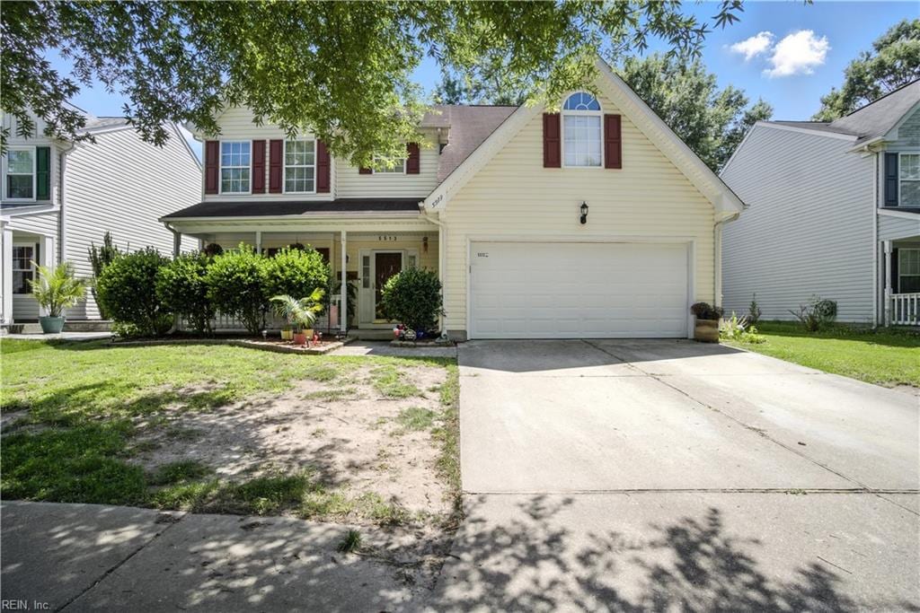 5513 Gosling Ct, Virginia Beach, VA 23462 - traditional-style house with driveway, a porch, and a front yard