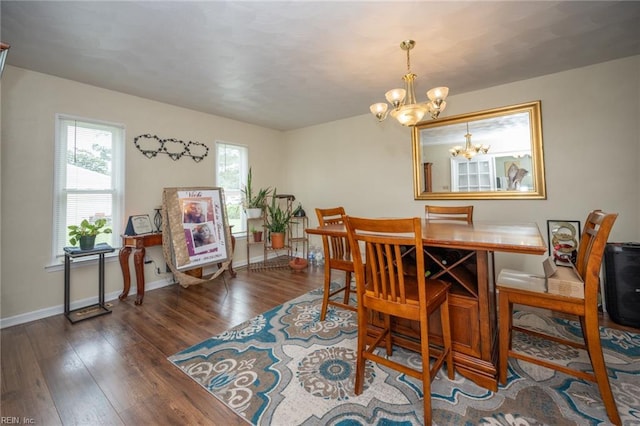 3318 Loam St, Norfolk, VA 23518 - dining room featuring a chandelier and wood finished floors