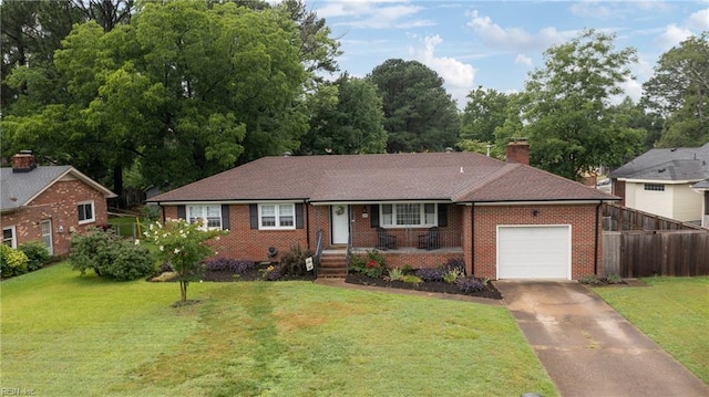 2440 Sir Lance Dr, Chesapeake, VA 23325 - single story home featuring a garage, brick siding, concrete driveway, and a chimney