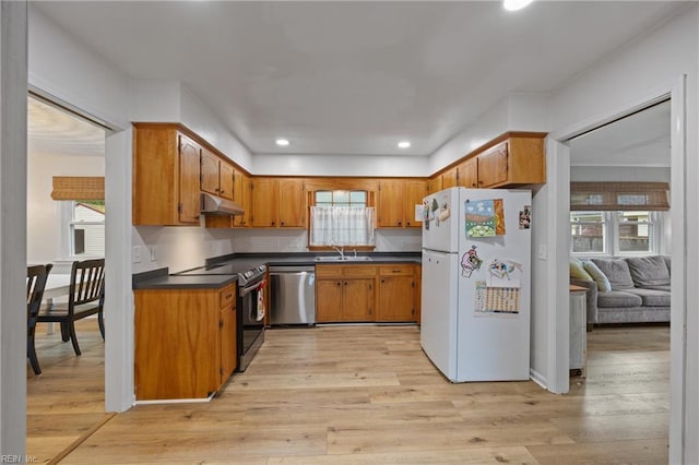2440 Sir Lance Dr, Chesapeake, VA 23325 - kitchen with freestanding refrigerator, dishwasher, range with electric stovetop, under cabinet range hood, and dark countertops