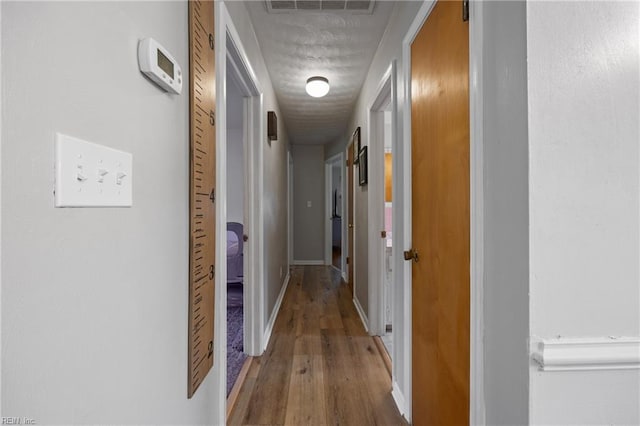 2440 Sir Lance Dr, Chesapeake, VA 23325 - hallway featuring wood finished floors and baseboards