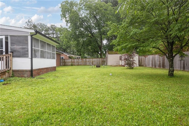 2440 Sir Lance Dr, Chesapeake, VA 23325 - fenced backyard with a sunroom and a storage shed