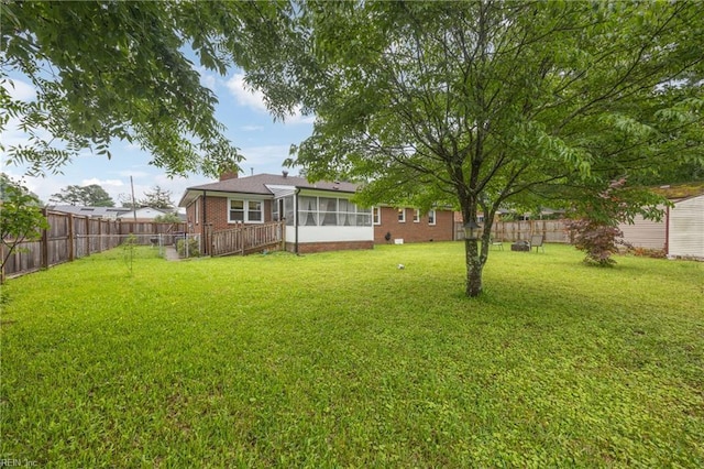 2440 Sir Lance Dr, Chesapeake, VA 23325 - fenced backyard featuring a sunroom
