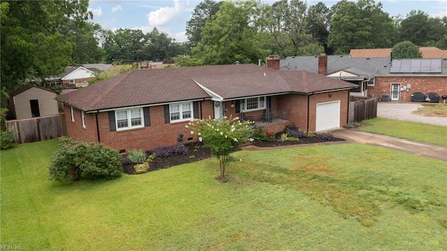 2440 Sir Lance Dr, Chesapeake, VA 23325 - ranch-style house with a garage, concrete driveway, brick siding, and a chimney