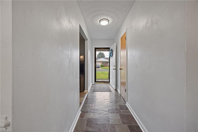 2440 Sir Lance Dr, Chesapeake, VA 23325 - corridor featuring stone tile floors and baseboards