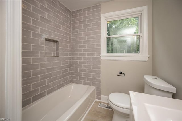 961 Hugo St, Norfolk, VA 23513 - full bathroom featuring vanity, tub / shower combination, and wood finished floors