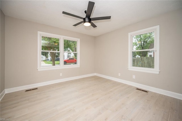 961 Hugo St, Norfolk, VA 23513 - spare room featuring light wood finished floors, a textured ceiling, and ceiling fan