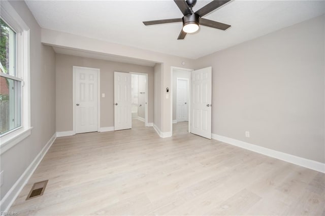 961 Hugo St, Norfolk, VA 23513 - unfurnished bedroom with light wood finished floors and ceiling fan