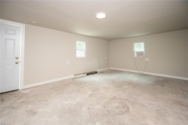 961 Hugo St, Norfolk, VA 23513 - empty room featuring unfinished concrete floors and healthy amount of natural light