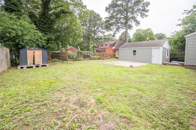 961 Hugo St, Norfolk, VA 23513 - fenced backyard featuring a patio and a storage shed