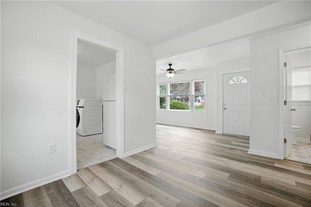 4400 Bart St, Portsmouth, VA 23707 - spare room featuring washer / dryer, wood finished floors, and a ceiling fan