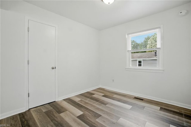4400 Bart St, Portsmouth, VA 23707 - unfurnished room featuring wood finished floors and a smoke detector