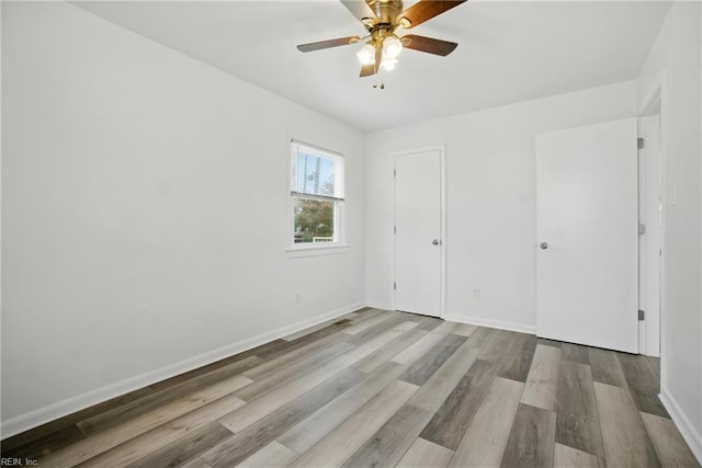 4400 Bart St, Portsmouth, VA 23707 - unfurnished bedroom featuring wood finished floors and ceiling fan