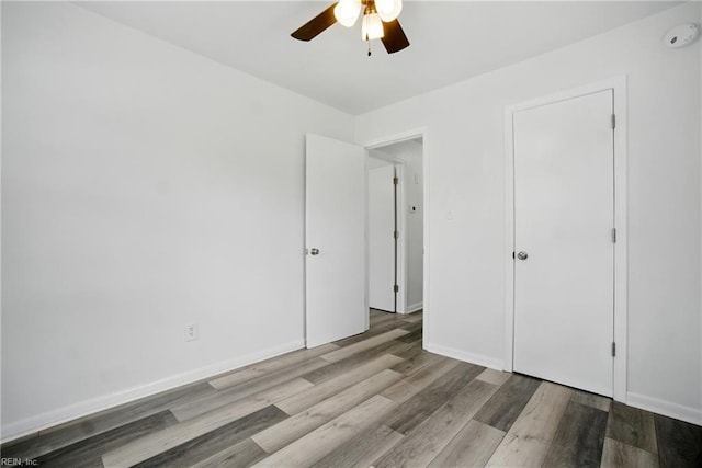 4400 Bart St, Portsmouth, VA 23707 - unfurnished bedroom featuring wood finished floors and ceiling fan