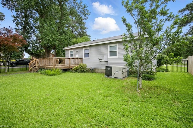 4400 Bart St, Portsmouth, VA 23707 - rear view of house with a deck, a fenced backyard, and crawl space