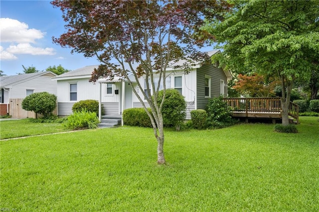 4400 Bart St, Portsmouth, VA 23707 - view of front facade with a front yard and a deck