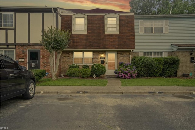 1733 Olde Buckingham Rd, Hampton, VA 23669 - view of front facade featuring brick siding, mansard roof, and a shingled roof