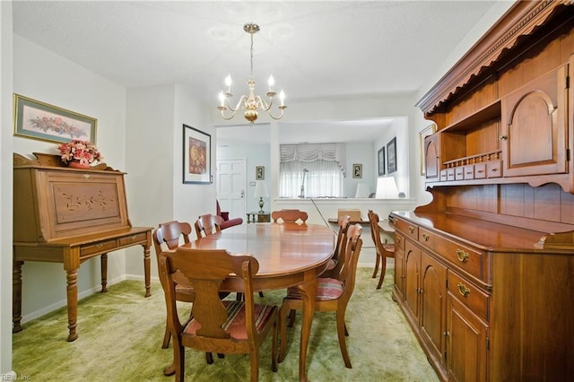 1733 Olde Buckingham Rd, Hampton, VA 23669 - dining room featuring light colored carpet and a chandelier