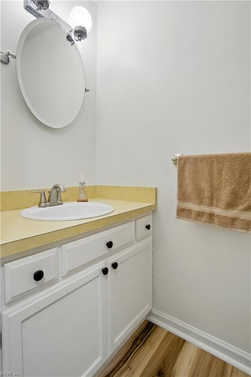 1733 Olde Buckingham Rd, Hampton, VA 23669 - bathroom with vanity and wood finished floors