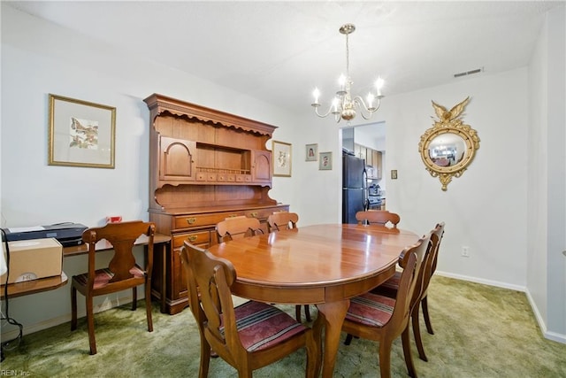 1733 Olde Buckingham Rd, Hampton, VA 23669 - dining room featuring a chandelier and light carpet