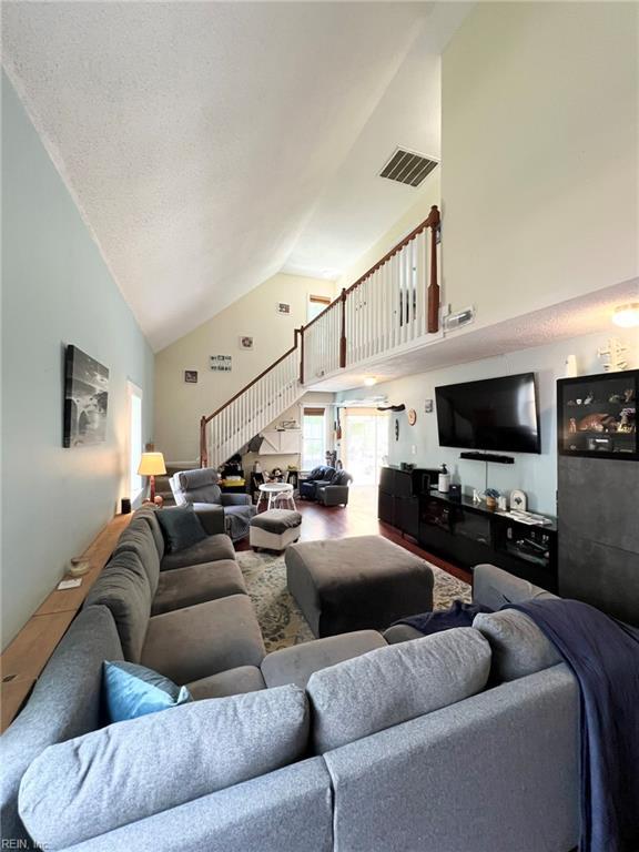 5806 Edith Ct, Virginia Beach, VA 23464 - living area with high vaulted ceiling and stairs