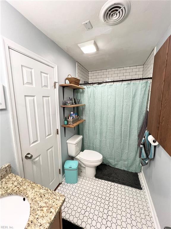 5806 Edith Ct, Virginia Beach, VA 23464 - bathroom featuring vanity and curtained shower