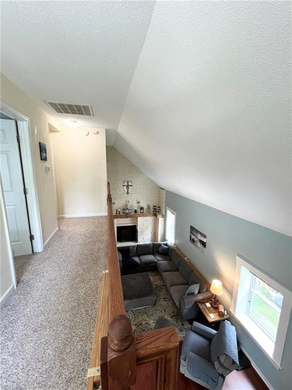 5806 Edith Ct, Virginia Beach, VA 23464 - living area with vaulted ceiling, a textured ceiling, and carpet floors