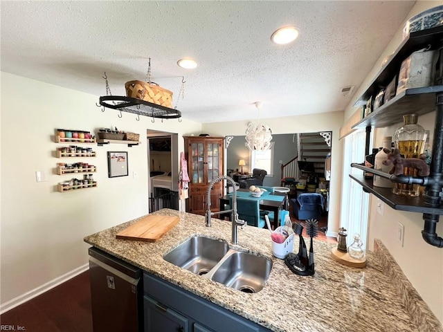 5806 Edith Ct, Virginia Beach, VA 23464 - kitchen featuring dishwasher, a textured ceiling, light stone countertops, blue cabinets, and recessed lighting