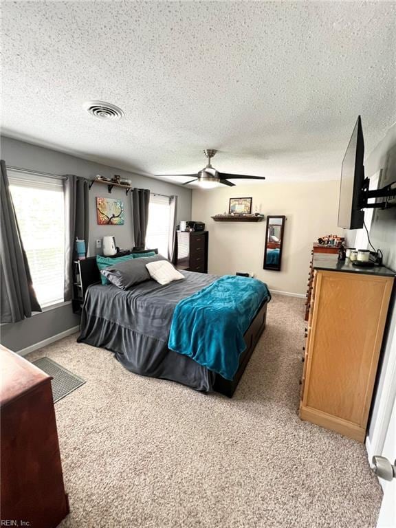 5806 Edith Ct, Virginia Beach, VA 23464 - bedroom featuring light carpet, a textured ceiling, and a ceiling fan