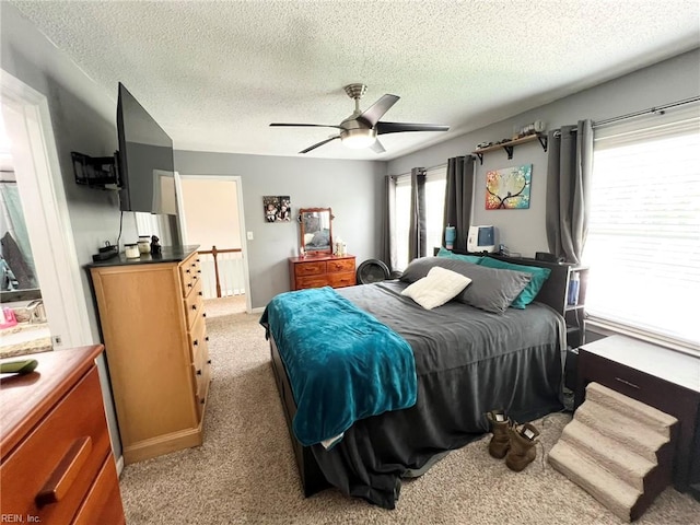 5806 Edith Ct, Virginia Beach, VA 23464 - bedroom with a textured ceiling, ceiling fan, and light carpet